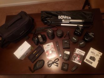 Canon EOS Rebel T6 DSLR Camera with 18-55mm and EF 75-300mm Lenses + Delux Bundle includes Filters, Tripods, Bag, SD Cards and more