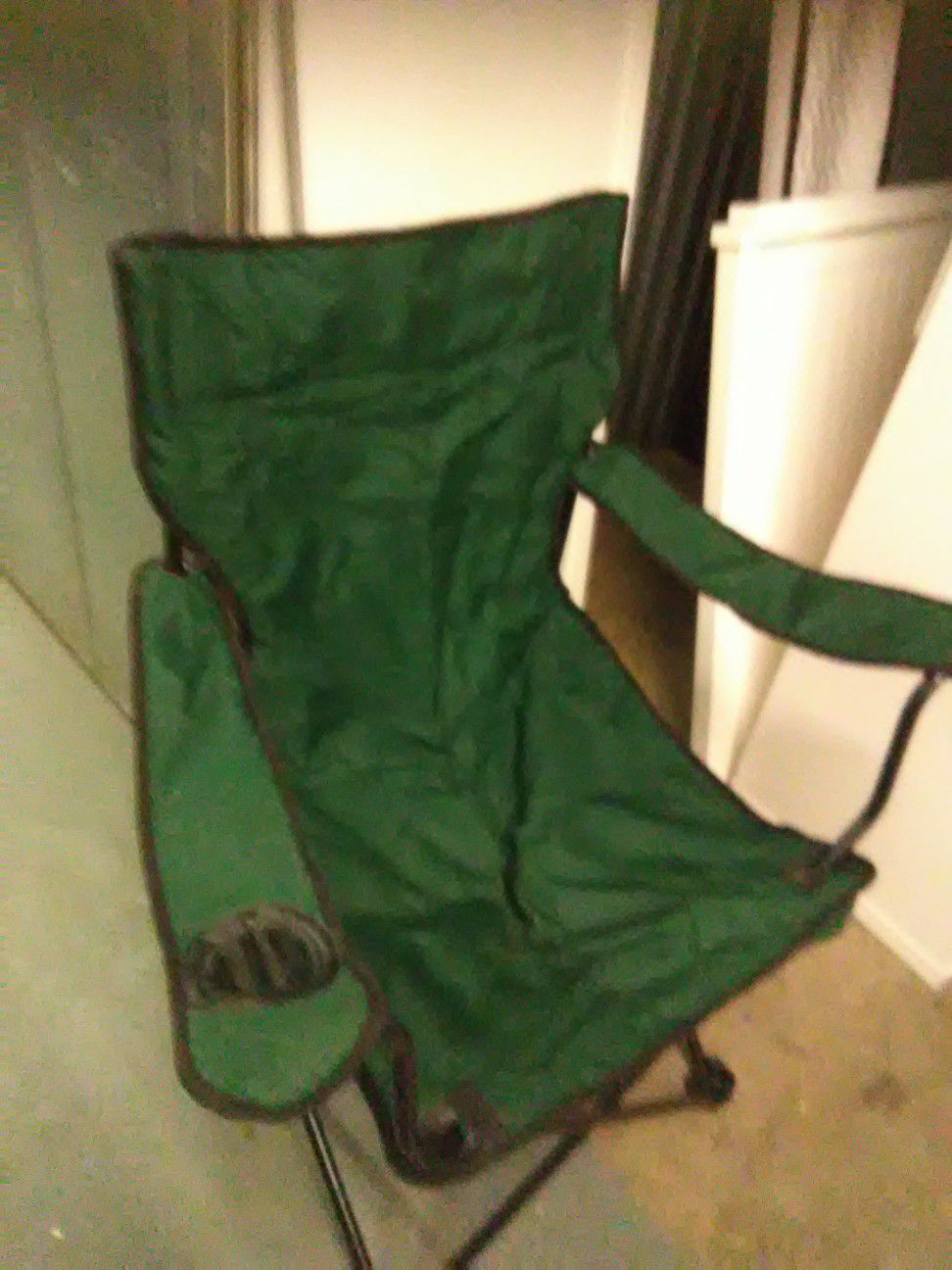 Green folding chair with carry bag