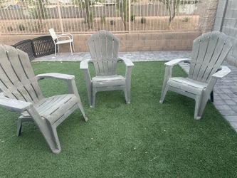 3 out side plastic chairs
