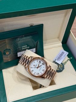 Rolex Daydate 40mm presidential rose gold white dial
