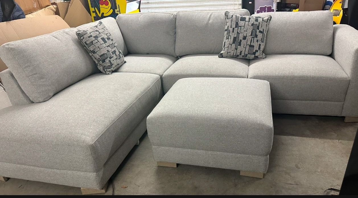 Drayden Fabric Sectional with Ottoman Retails for over $1,400 Features: Pocket Coil Seat Cushion Sinuous Spring Seat Support Solid Wood Legs Inc