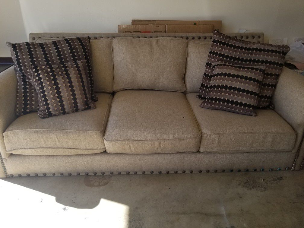 Beautiful Tan upholstered 3 seat couch / sofa