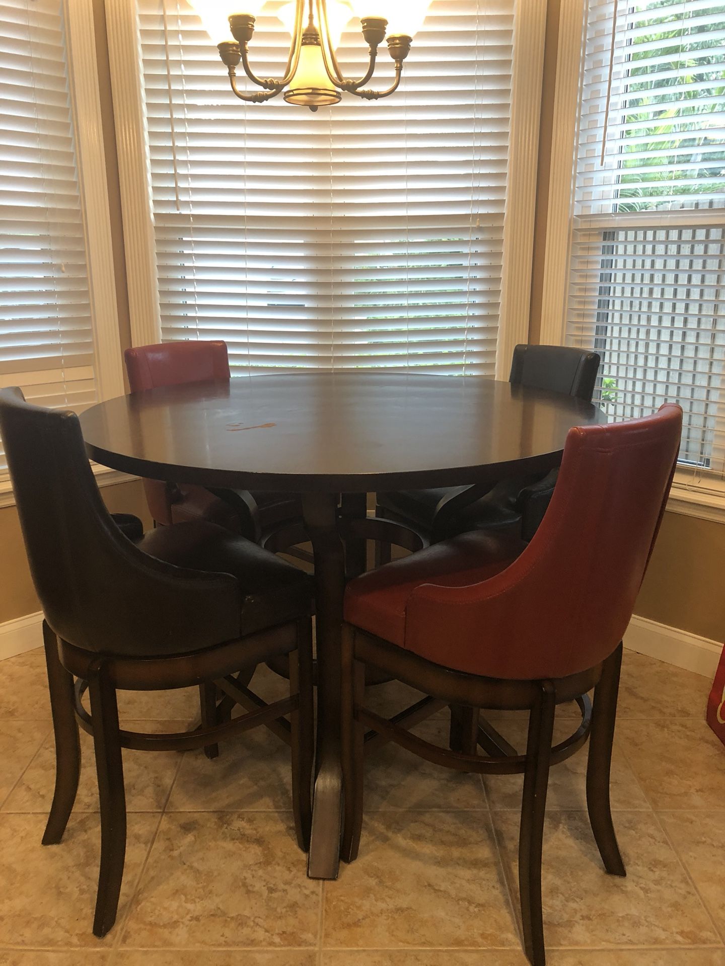 High top 52” round table with 7 chairs