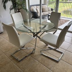 “Modern Glass Dining Table with Chrome Legs + 4 Faux Leather Chairs (Chrome Legs)”