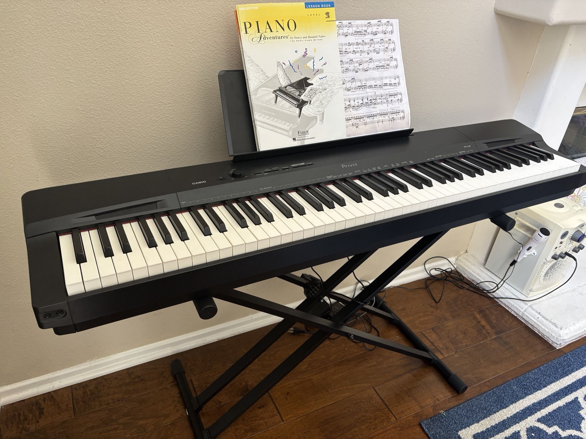 “Casio Privia PX digital piano 88 weighted keys with stand and pedal”