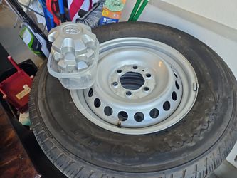 4 Toyota Steel Wheels with Tire and Center Caps