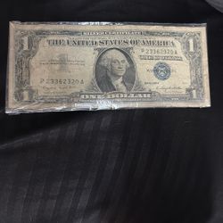series 1957 A One Dollar Note In Silver Payable To Bear On Demand