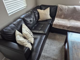 Faux leather brown sectional & coffee table