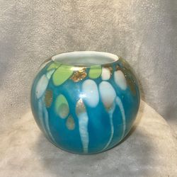 Art glass double walled turquoise Vase or candle holder. Vase has copper sparkles in the glass. 