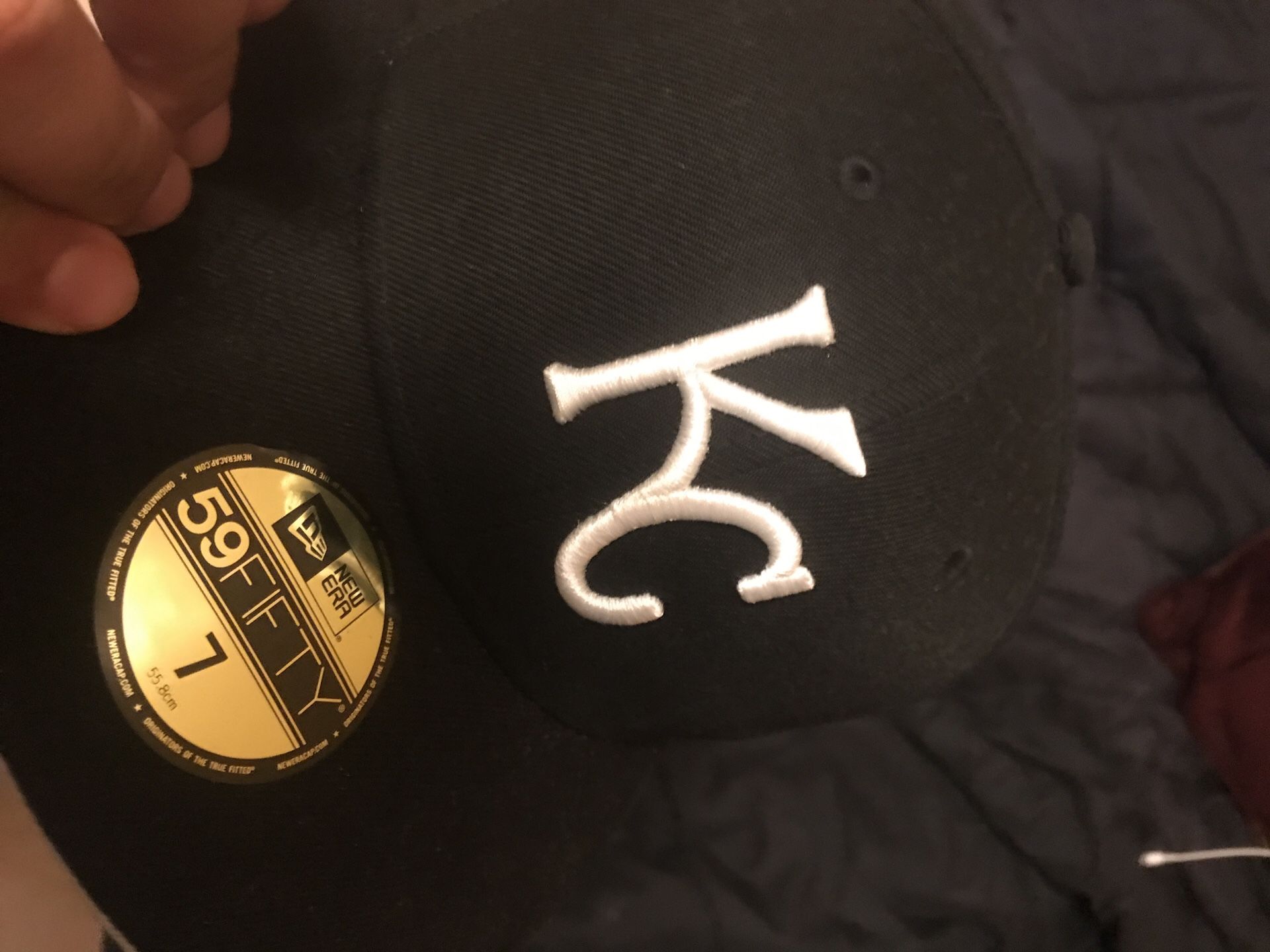 Black KC hat. Size 7 brand new still