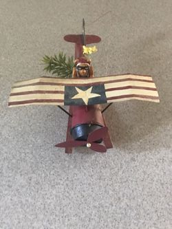 Bear in metal plane