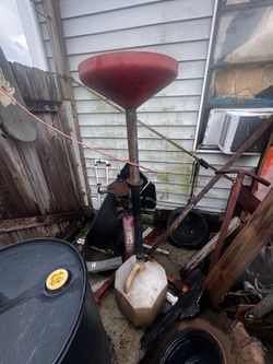 Portable telescoping oil lift drain dolly