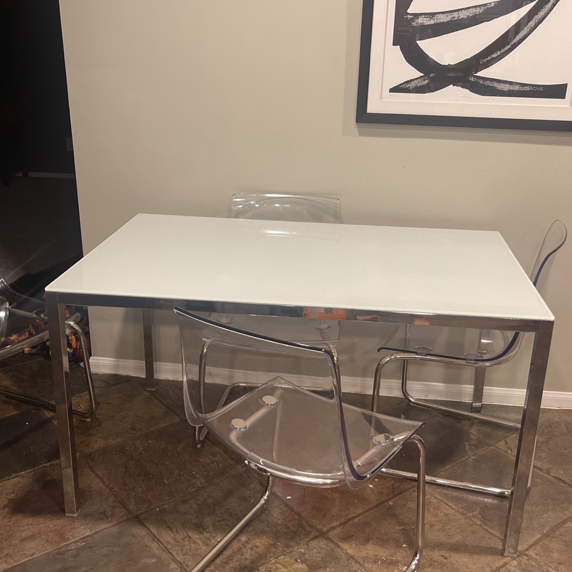 Dining Table  &  Clear and Crome chairs 53 inches Long By 33 .5 inches