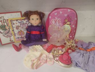 Fancy Nancy Doll with clothes, backback, and 2 books.