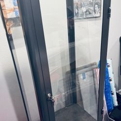 FABRIKÖR Glass-door cabinet, dark gray, 22 1/2x59