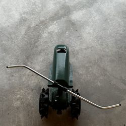 Orbit water sprinkler - traveling tractor 