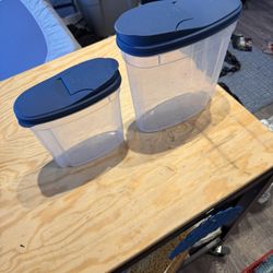 Two Different Sized Cereal Containers With Pop Tops 