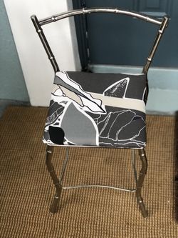 Small 22”x10” decorative chrome chair 