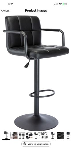 Black leather bar stool swivels