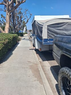 Truck with pop up trailer