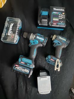 Lightly used Makita Impact Gun/Hammer Driver Drill Tool Set w/ bonus drill bit set included.