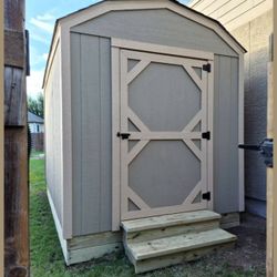 8x12 low barn shed , includes: 1 shed door, all around shelves,paint and caulking , 1 door steps,