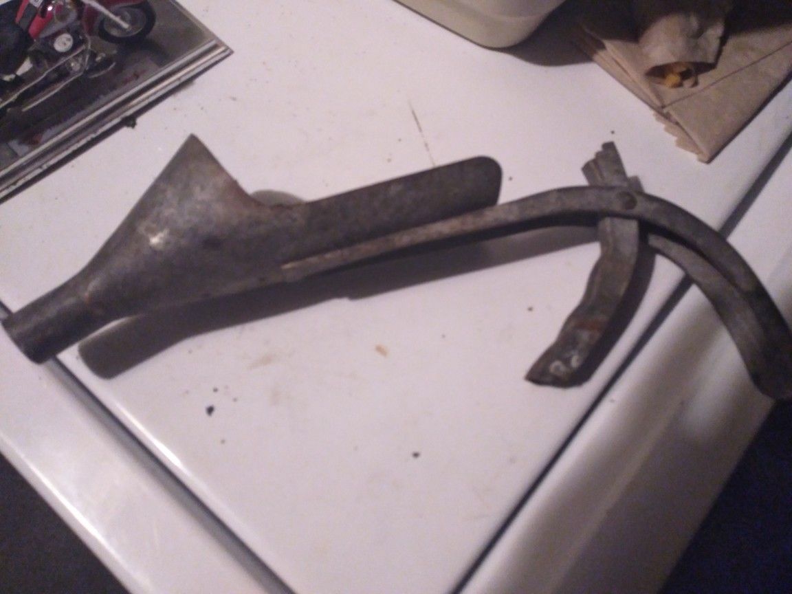 Very old oil can tool