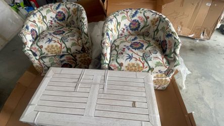 Beautiful swivel chairs with a coffee table—pieces from BALLARD DESIGNS.