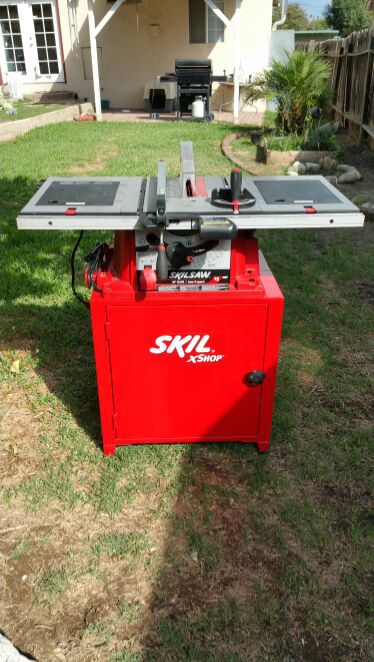 SKIL X-SHOP 10" 15AMP TABLE SAW WITH BELT SANDER, ROUTER,DRILL PRESS THEY CAN BE ATTACHED TO TABLE SAW. IN NEW CONDITION ONLY USED ONE TIME