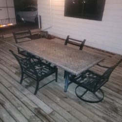 Large Rectangle Heavy Stone Patio Table With 2 Swivel And  2 Standard Chairs And 8 Cushions With Storage Box