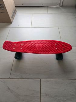Used Penny Board Red Skateboard