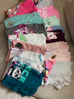 Children place shirts