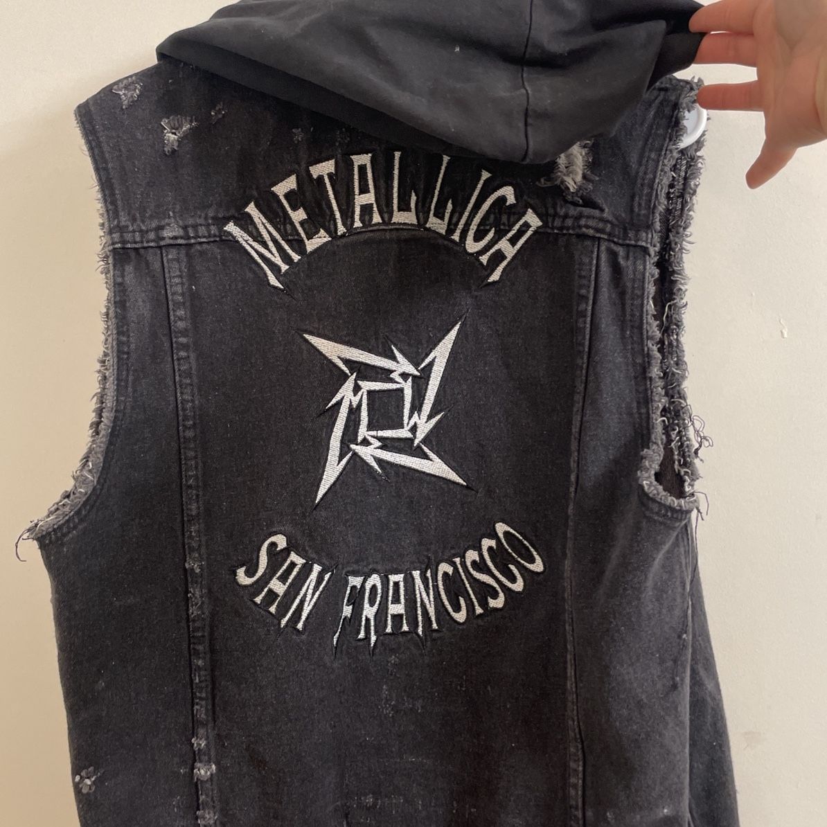 Black denim vest with detachable hoodie and embroidered 'Metallica San Francisco'