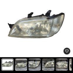 2002-2003 MITSUBISHI LANCER JDM LEFT DRIVER SIDE HEADLIGHT OEM STANELY P116