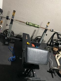 Weight bench with  i think 190lbs of weights
