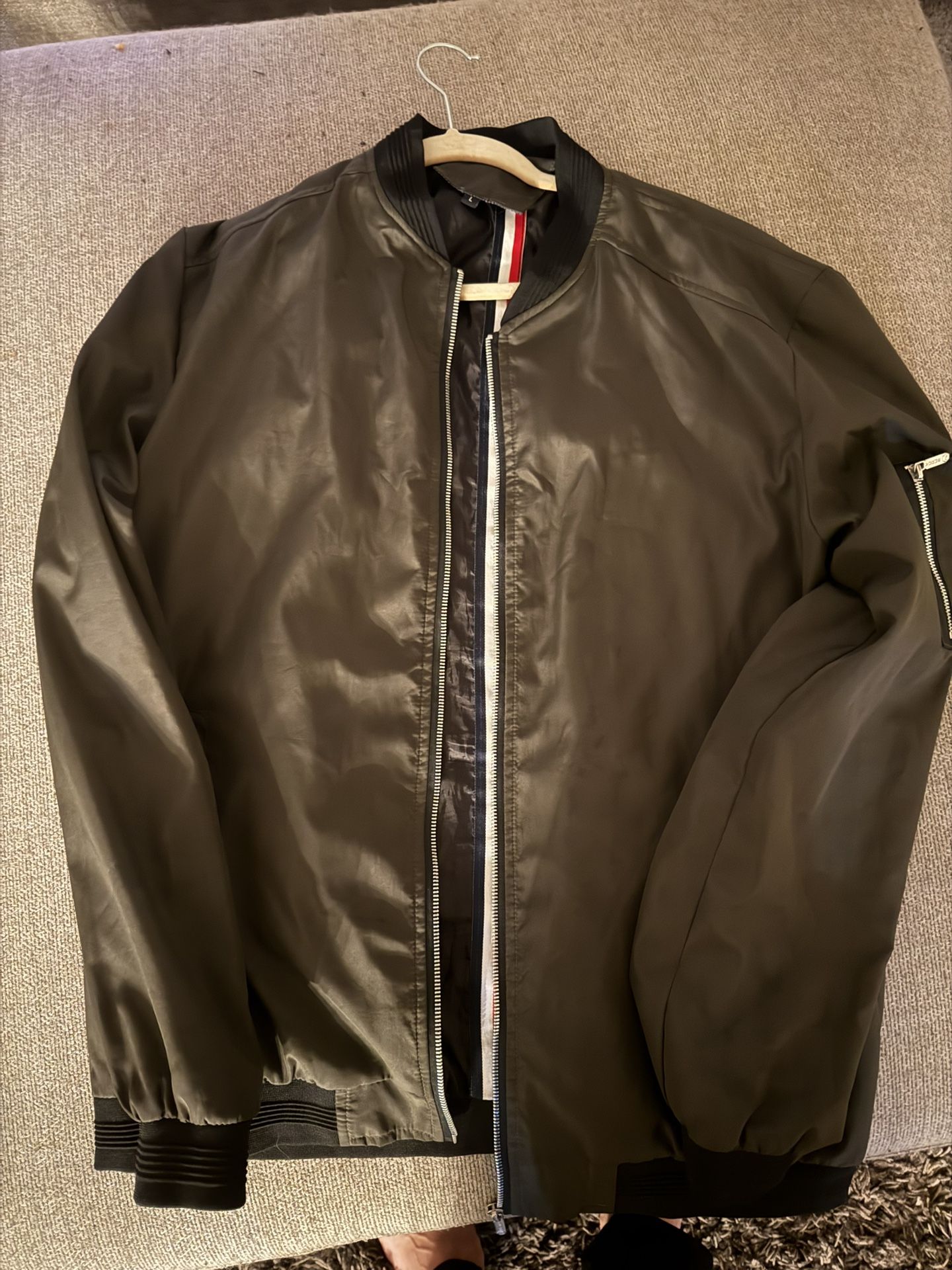 green bomber jacket.