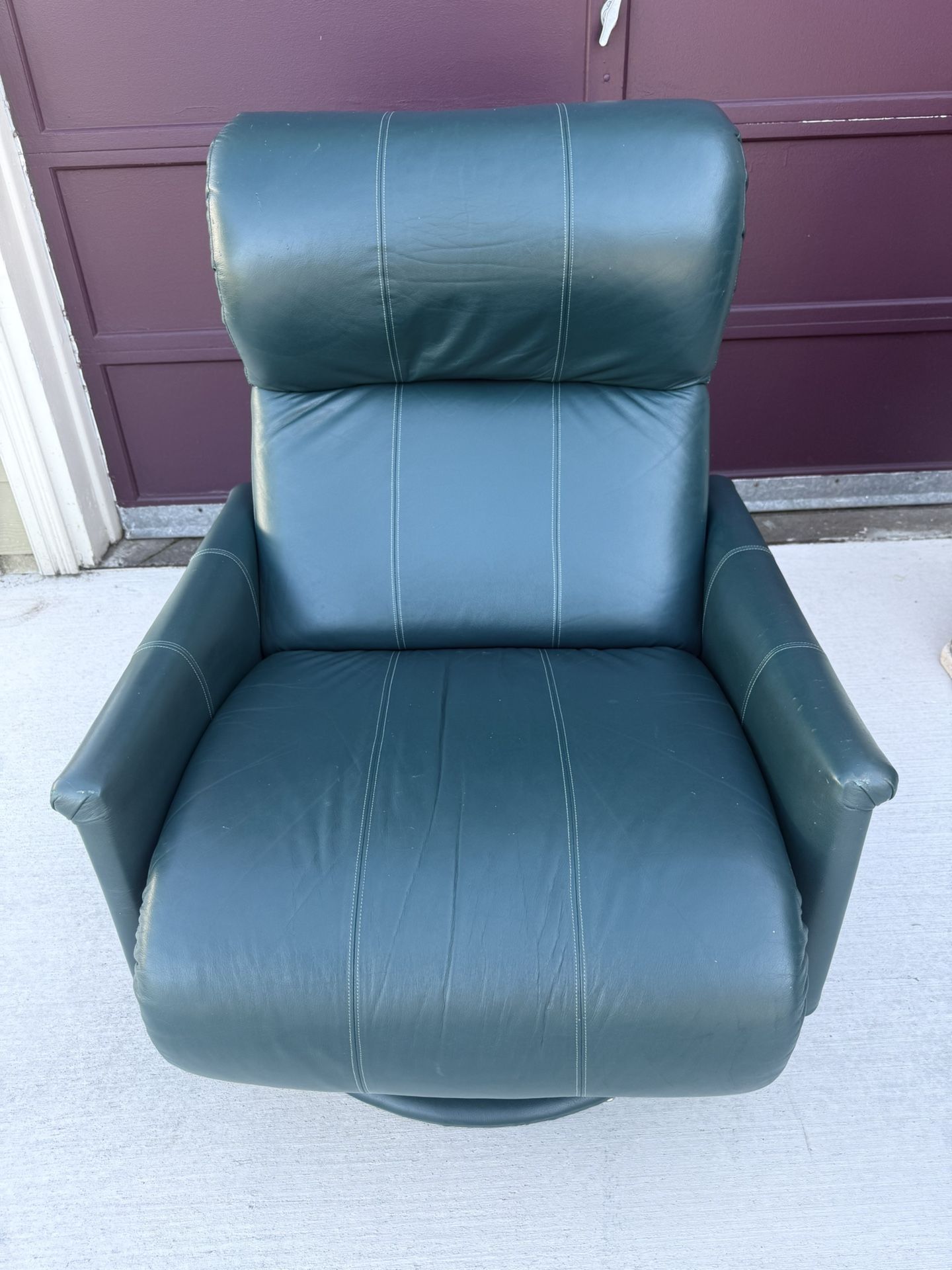LEATHER RECLINER - Swivels & Rocks