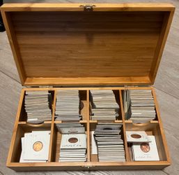 Coin box , wooden. With latch, dividers for coins stored in flips.