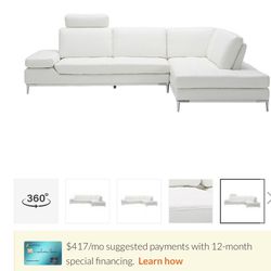 White Italian Leather Sectional Sofa, and Glass Coffee Table .