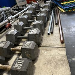 Four Sets Of Dumbbells  50, 55,65,75 Lb 