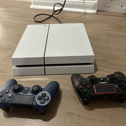 PS4 White 500GB plus 2 Controllers And 2 Games