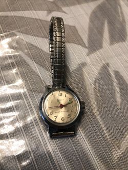 Vtg Timex Water Resistant Woman’s Wristwatch - Silvertone, Stretch Band