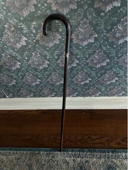 Antique 1914 gentleman’s walking cane with Sterling silver band