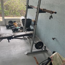 weight rack with barbel and weights