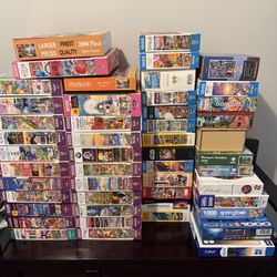 Puzzle Lot – 49 Total Puzzles (Various Piece Counts) 🧩