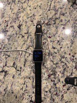 Apple Watch with the charger