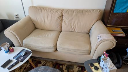 Cream-Colored Loveseat