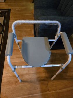 Commode with Arm Rests