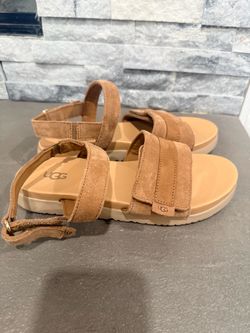 Ugg sandals.  Size 6