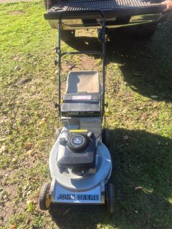 John deere self propelled mower with bag